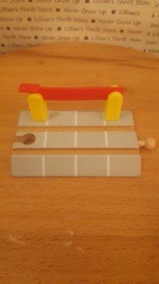 wooden train crossing gate